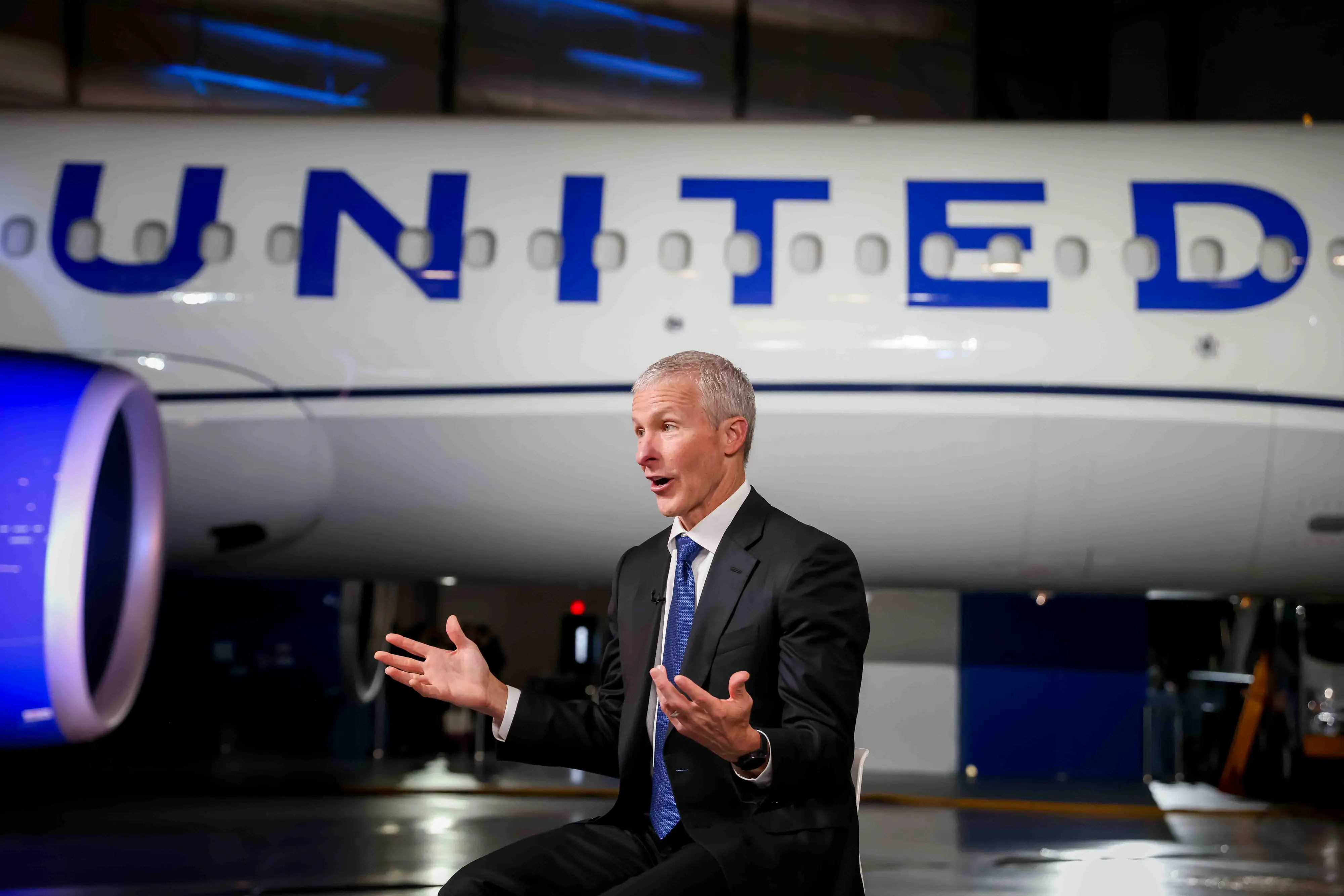 Scott Kirby speaks during a TV interview