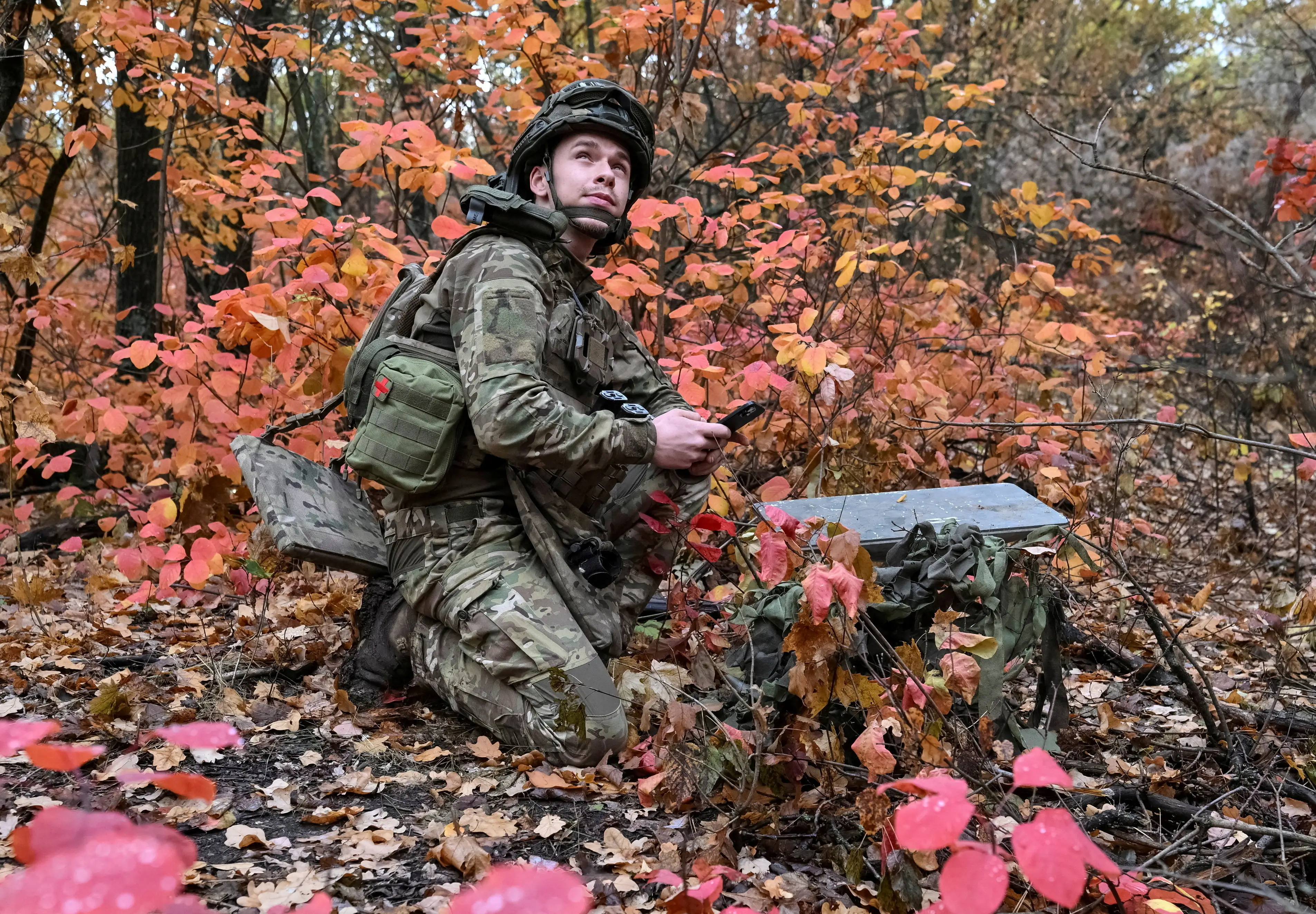 FILE PHOTO: An artilleryman of the Special Rifle Police Battalion of Zaporizhzhia region sets up a Starlink satellite internet system at a position amid Russia's attack on Ukraine, near the frontline in the Donetsk region, Ukraine, October 16, 2026.