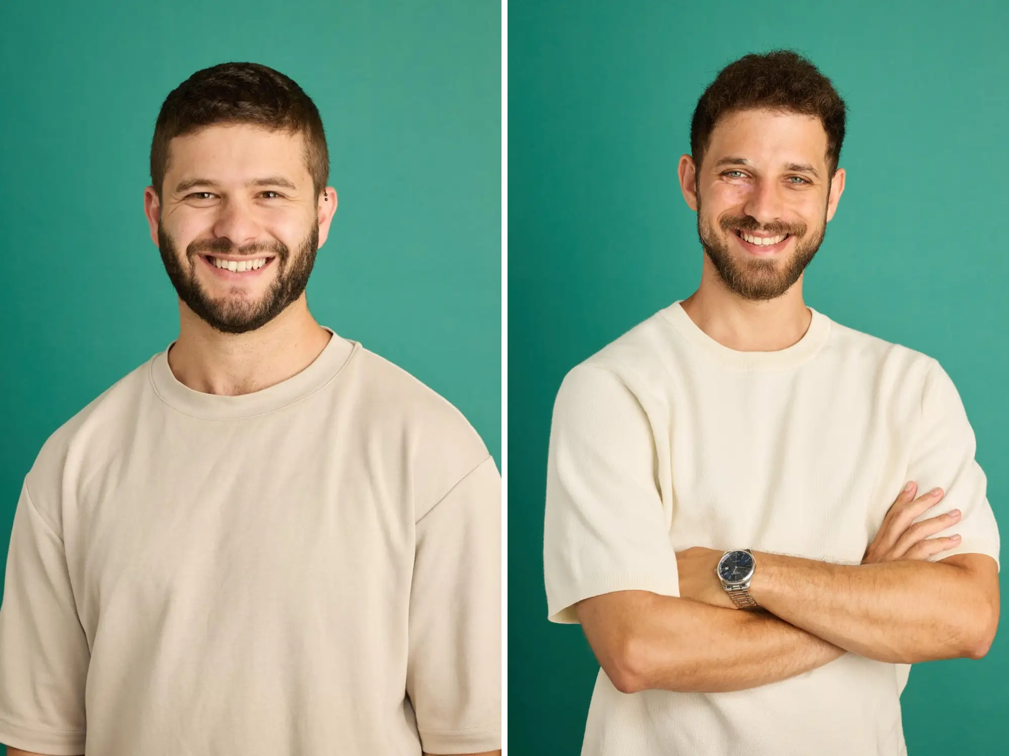 Two smiling bearded people in cream shirts pose side by side against a teal studio background.