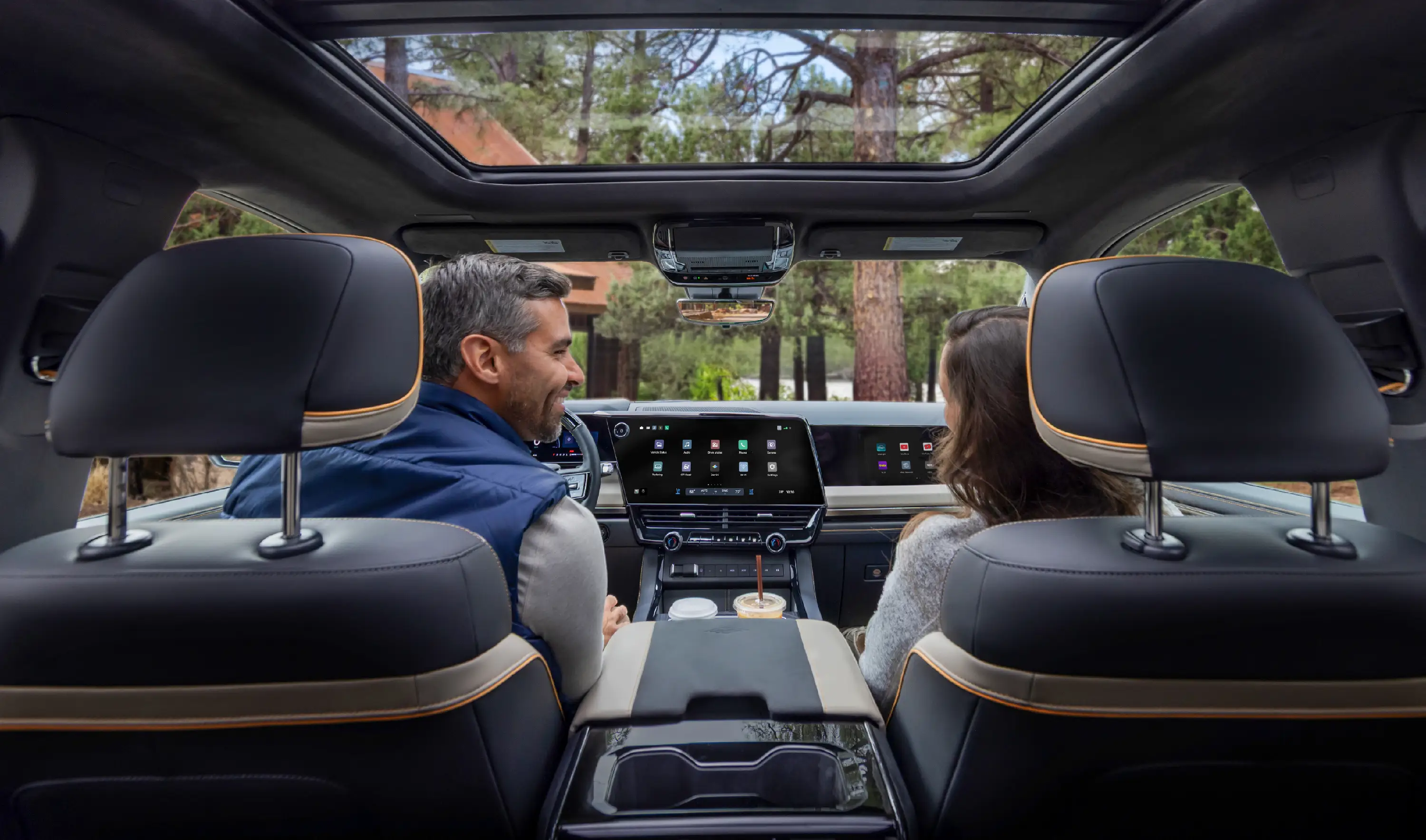 Two occupants sit inside a 2027 Chevy Silverado.