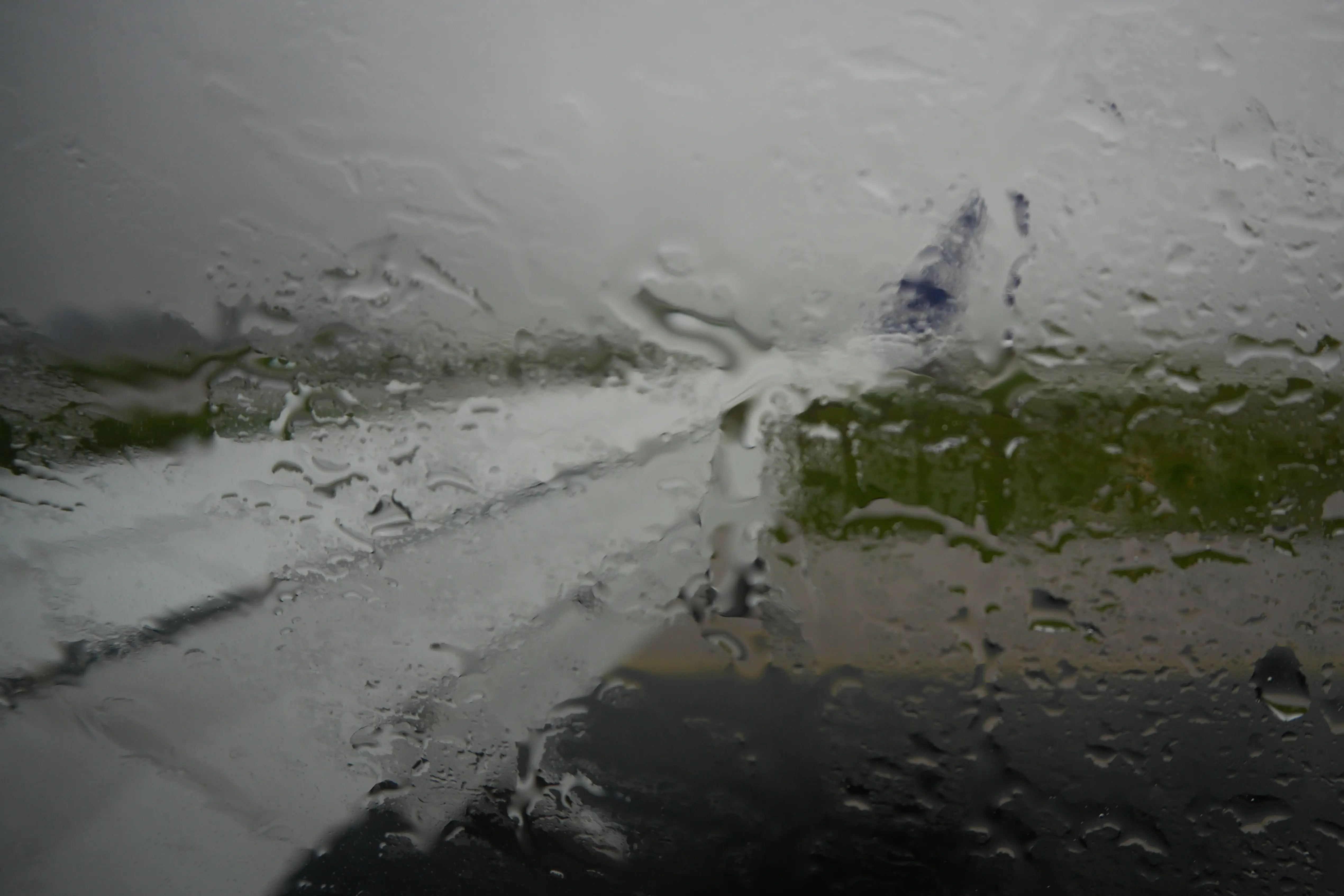 Rain drops are seen on the window of a Boeing 737 airliner