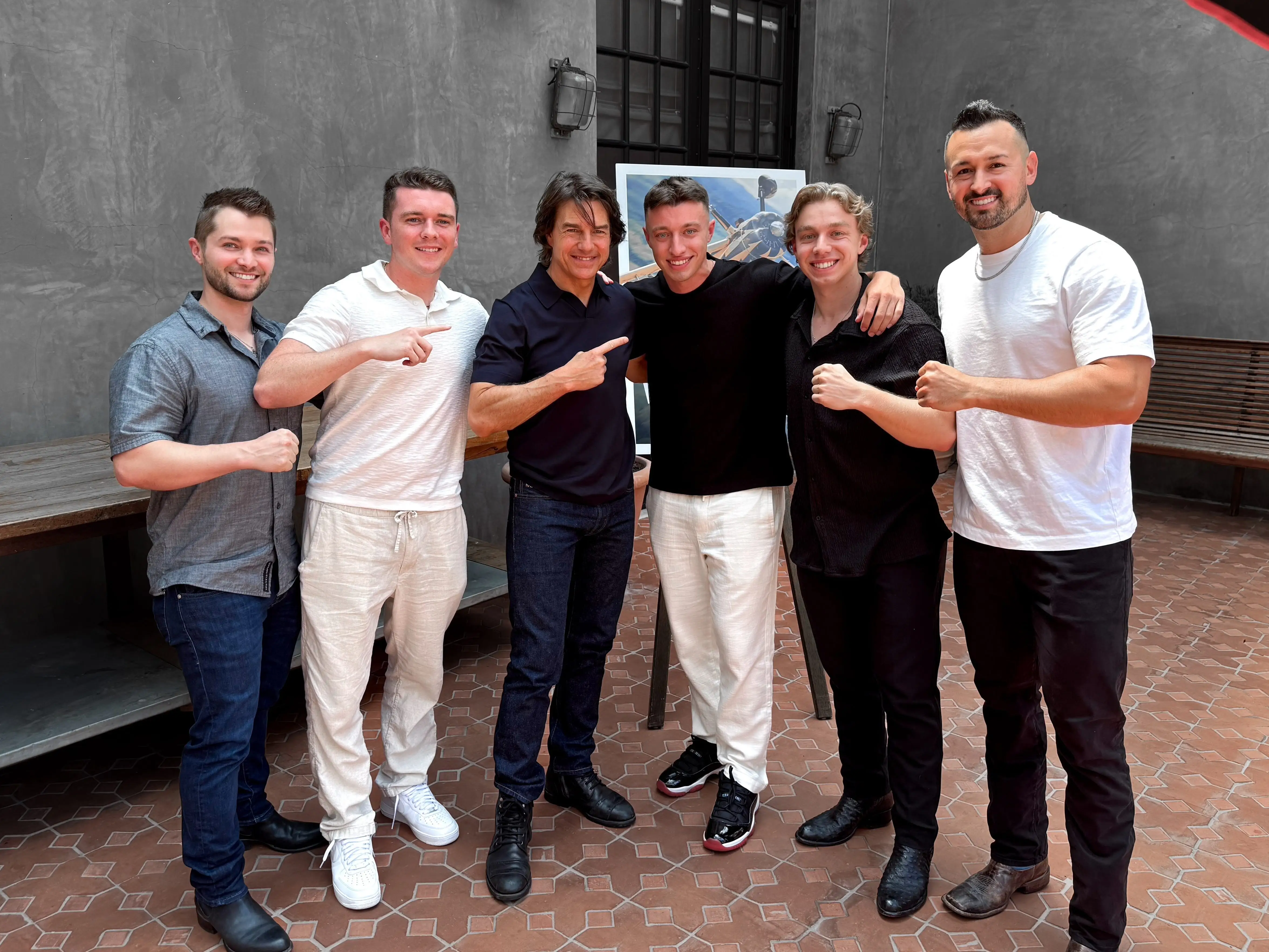 School of Hard Knocks team pose with Tom Cruise