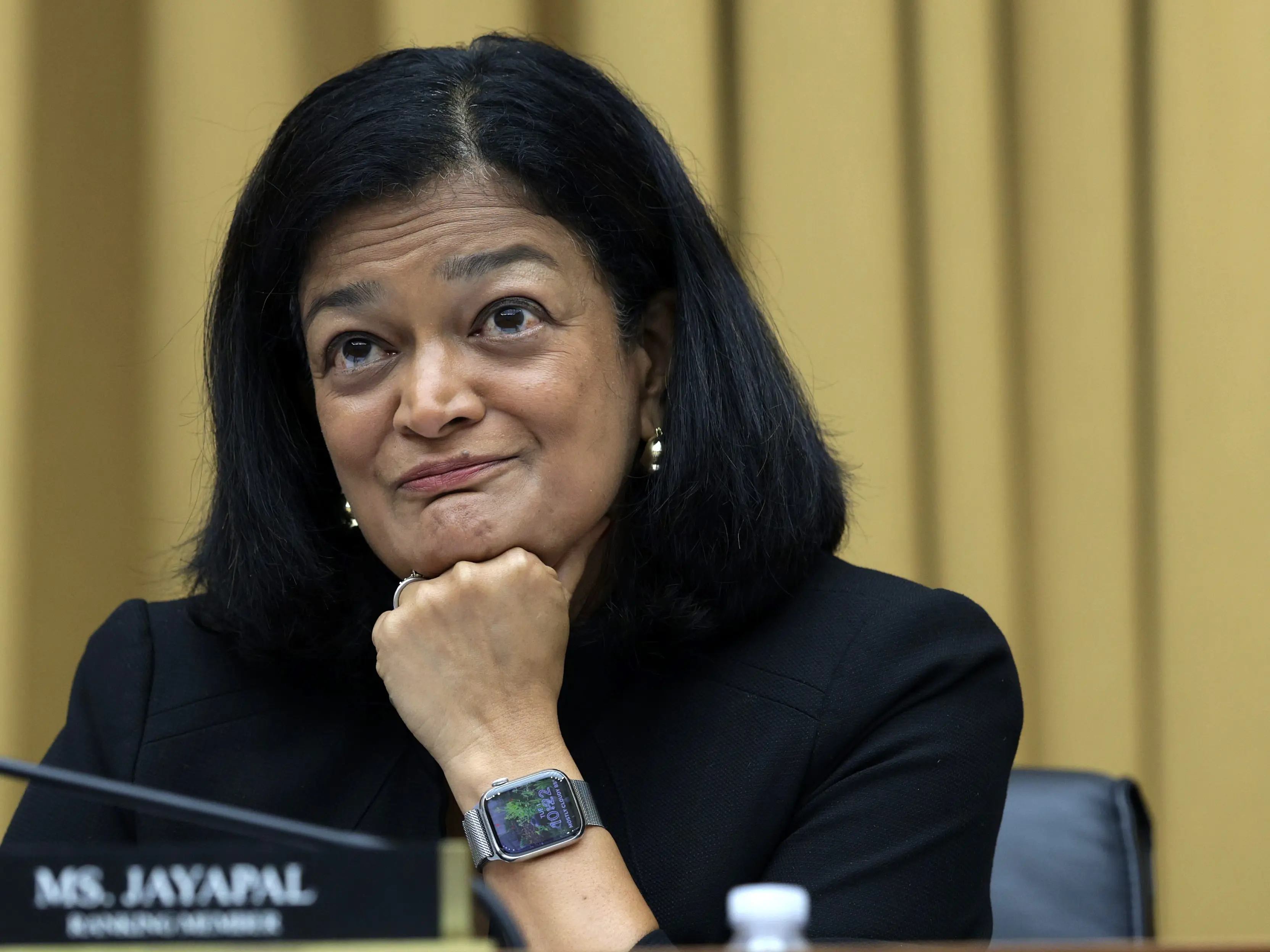 A woman in a suit.