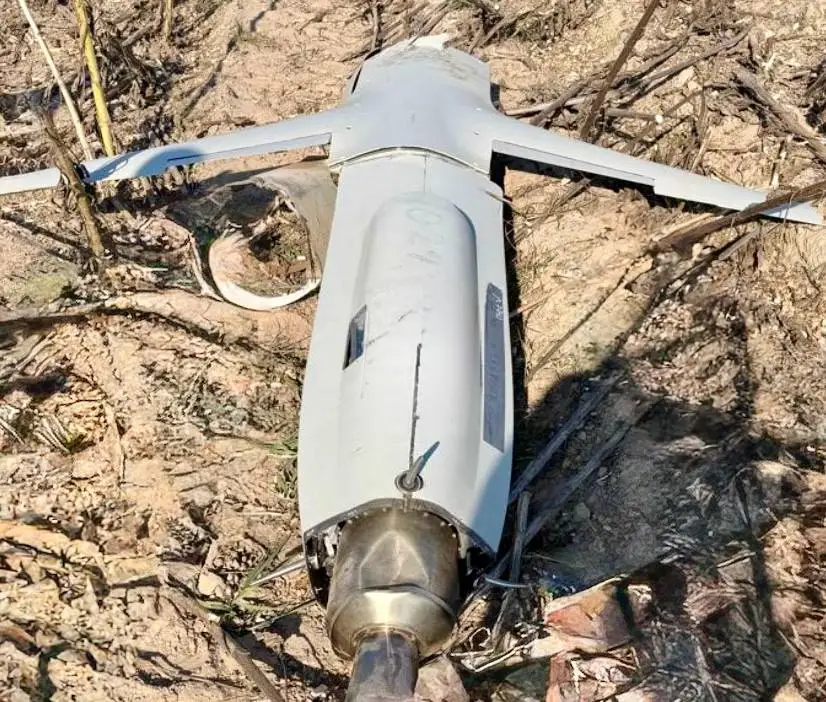 Debris from the chassis of a Filin cruise missile lies on the ground.