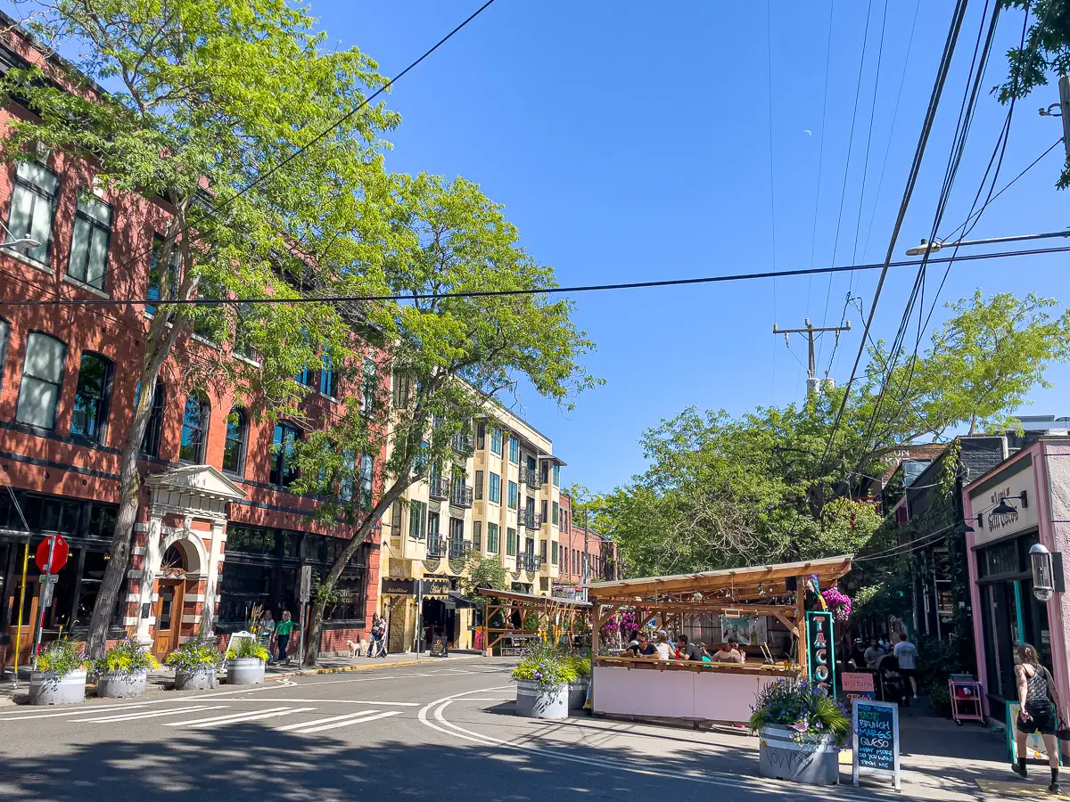 A quiet street with restaurants in Seattle.