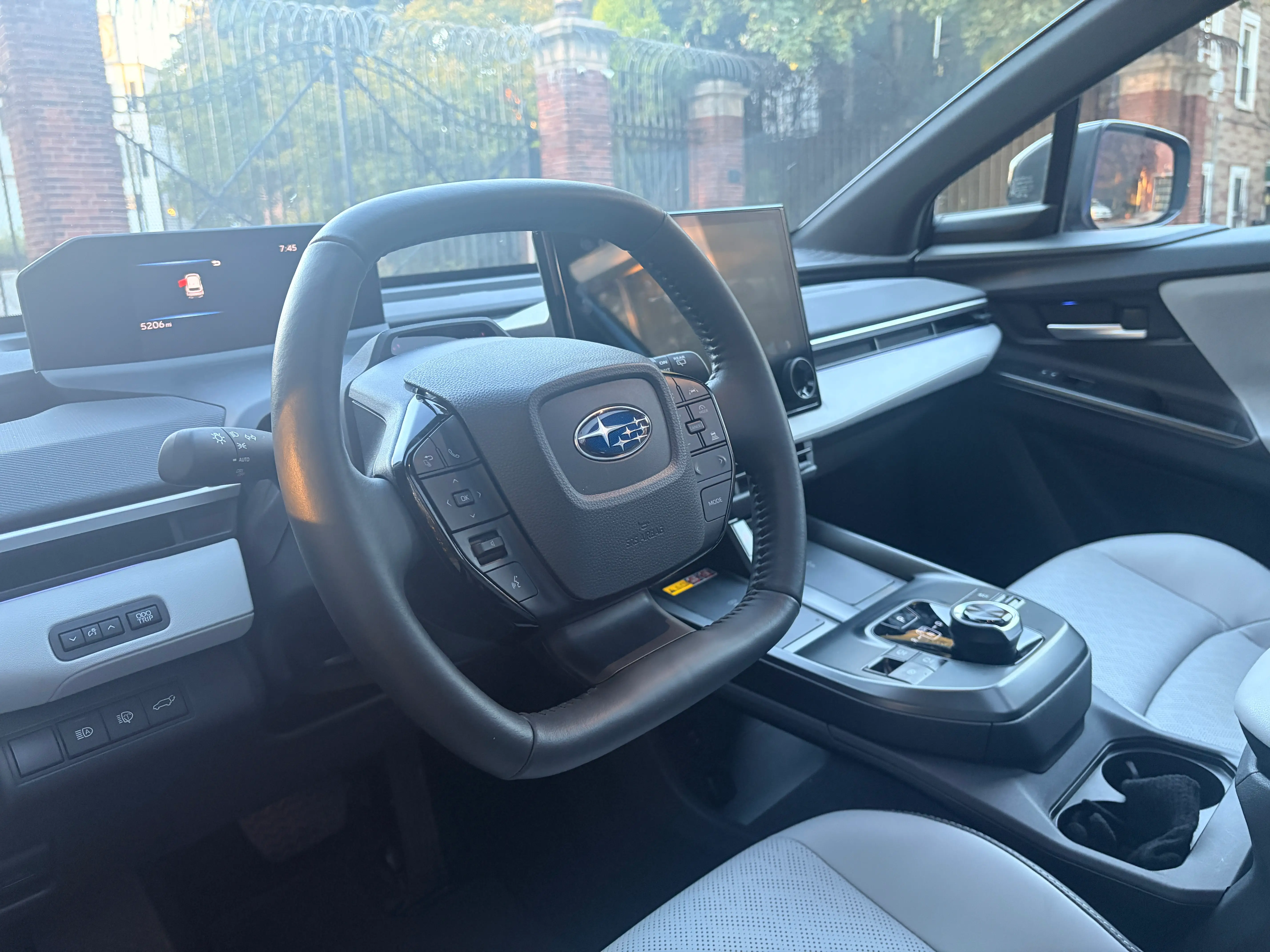 The steering wheel of a Subaru Trailseeker.