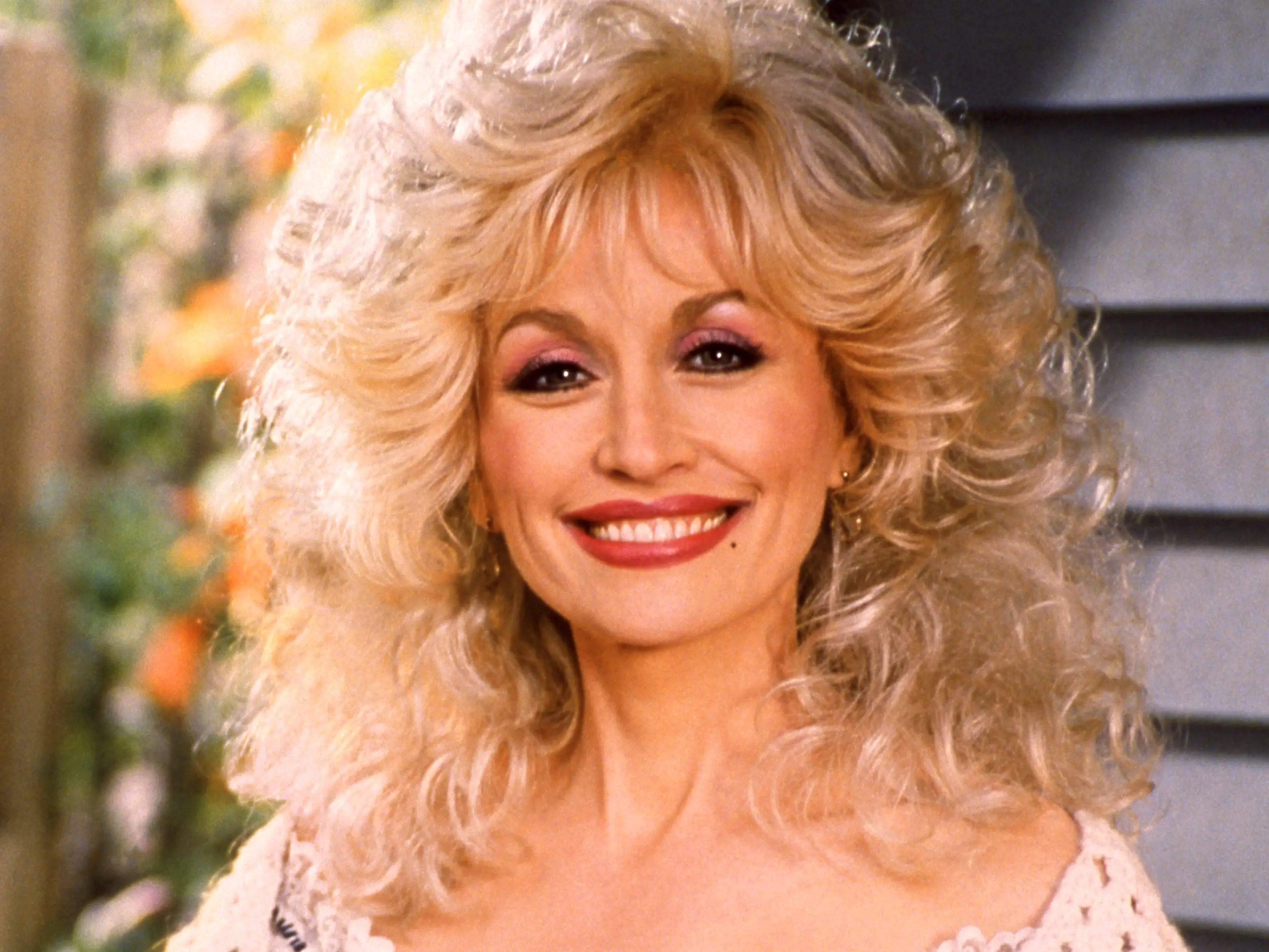 American singer-songwriter, actress, and businesswoman Dolly Parton, poses for a portrait circa 1995 at Dollywood in Pigeon Forge, Tennessee.