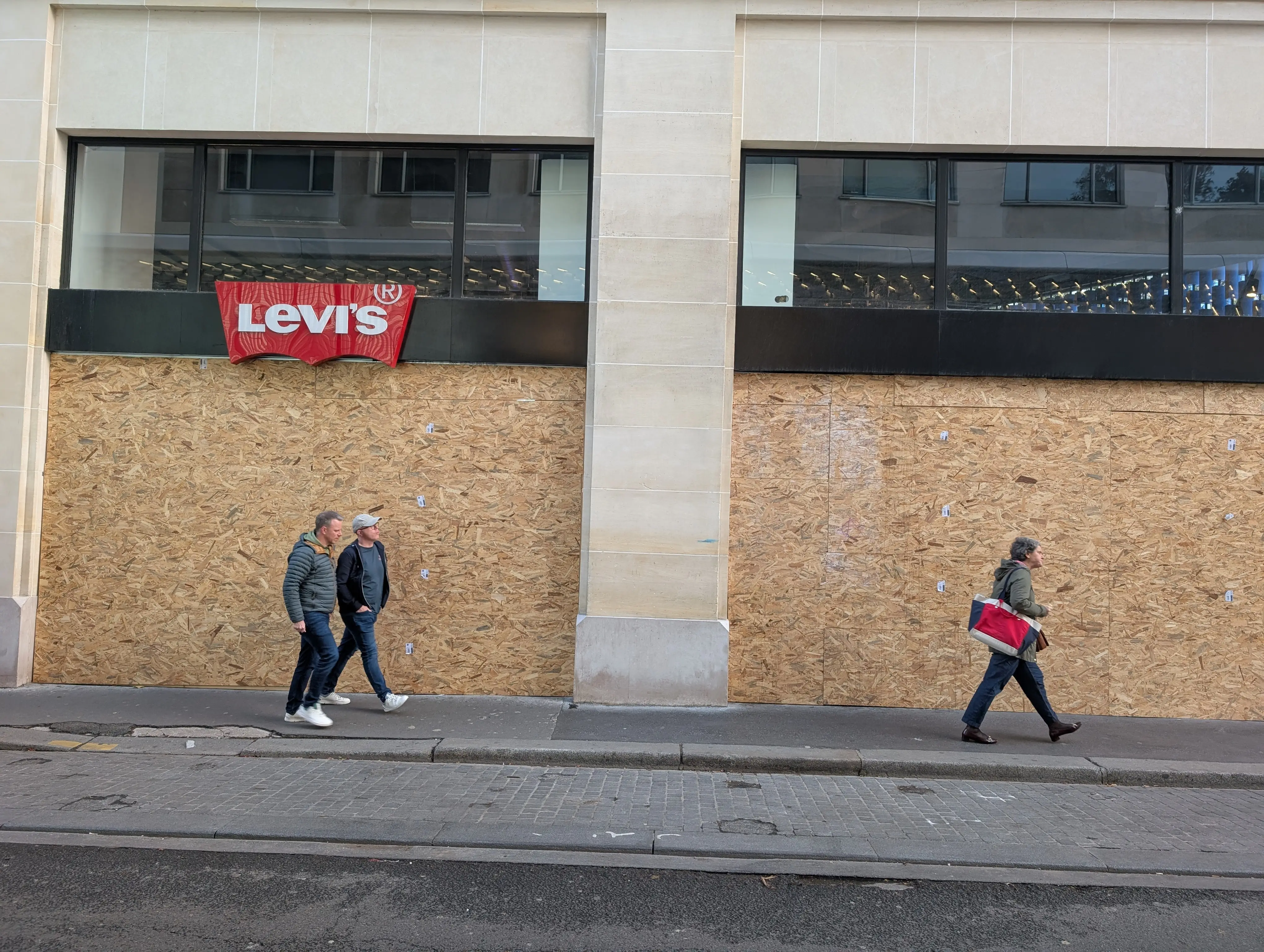 Wooden boards in front of the Levi's shop windows