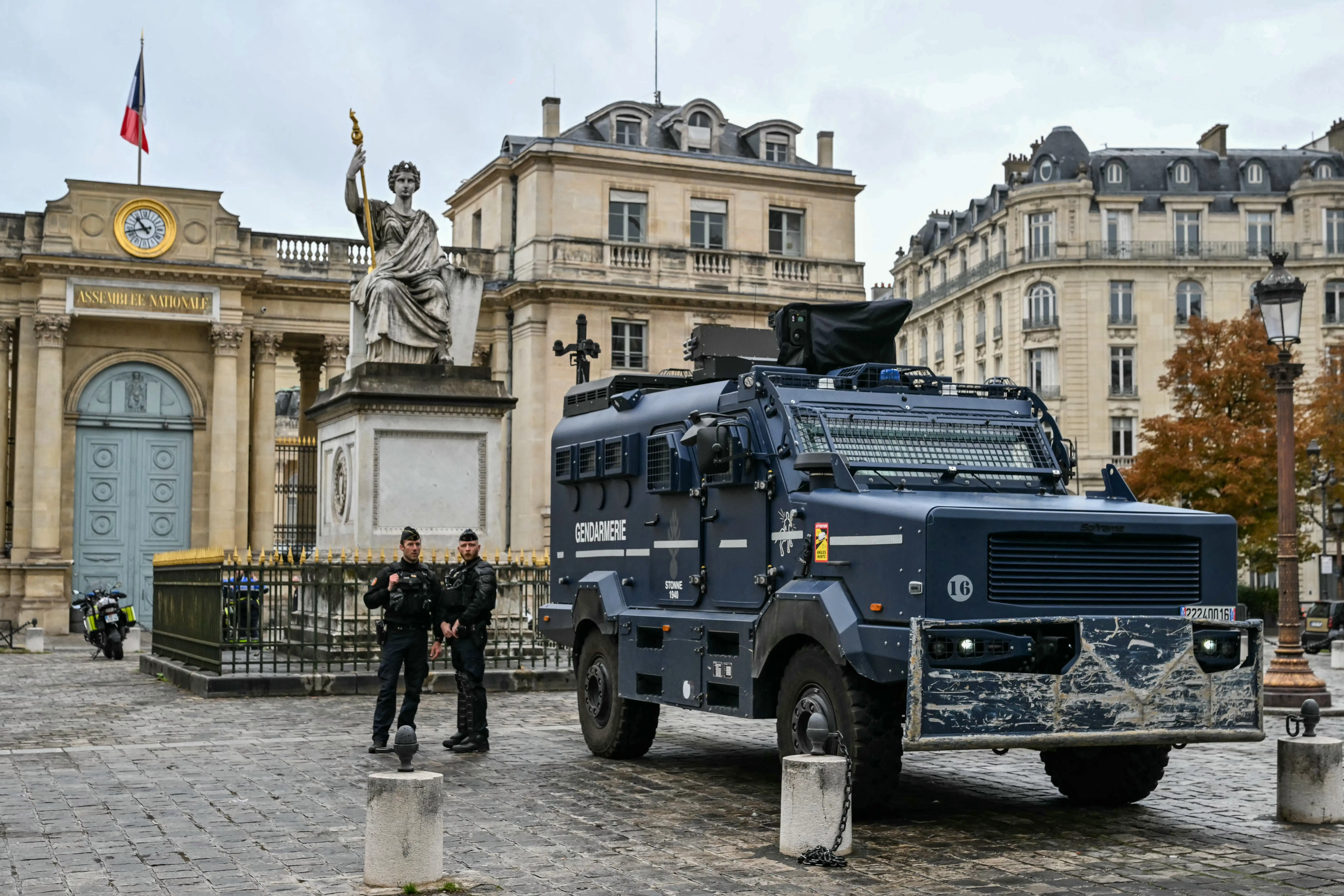 A  multipurpose intervention vehicle in front of the National Assembly building in Paris.