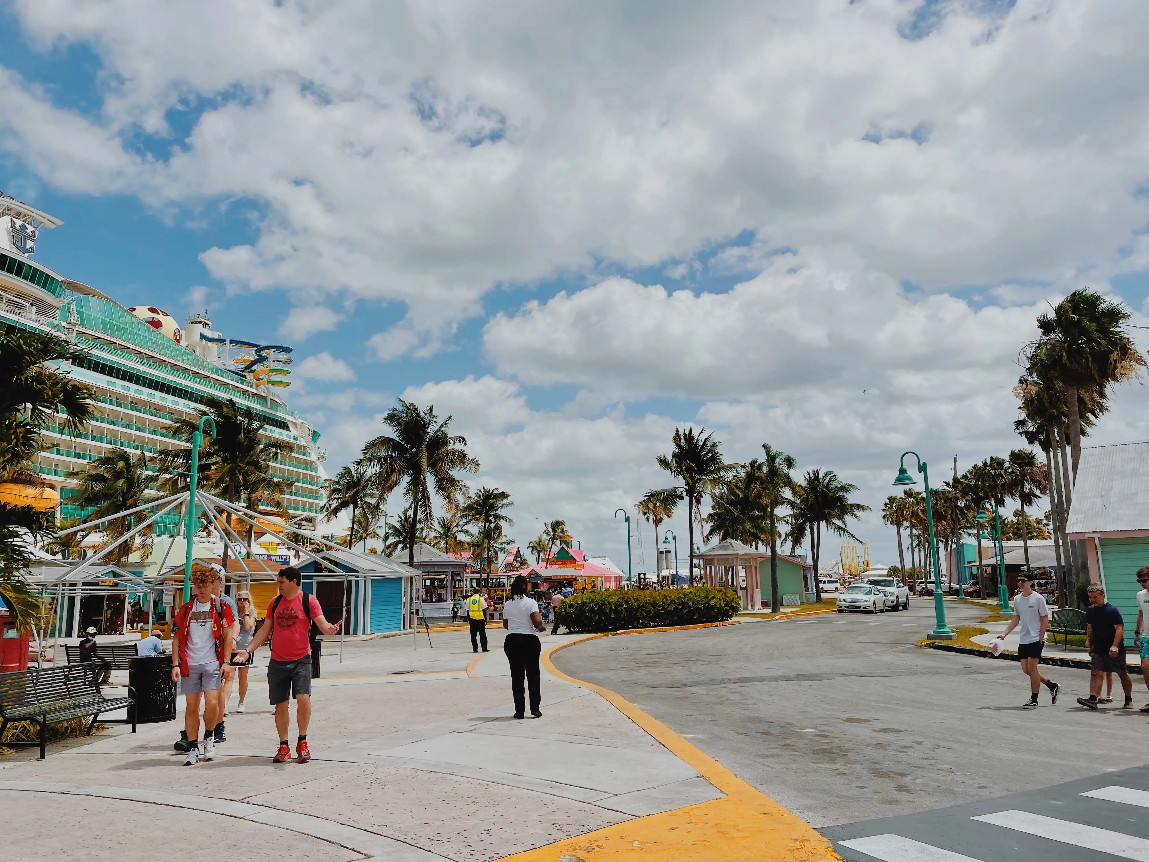 Cruise ship docked near FReeport, people walking