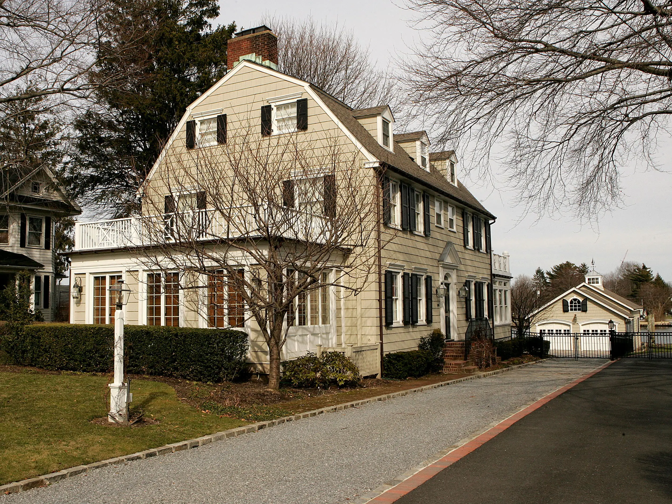Real estate photograph of a house located at 112 Ocean Avenue in the town of Amityville, New York March 31, 2005. The Amityville Horror house rich history and beauty are overshadowed by the story of George and Kathy Lutz, the previous residents of 112 Ocean Avenue, who claimed that shortly after moving into the house they fled in terror driven out by paranormal activity.