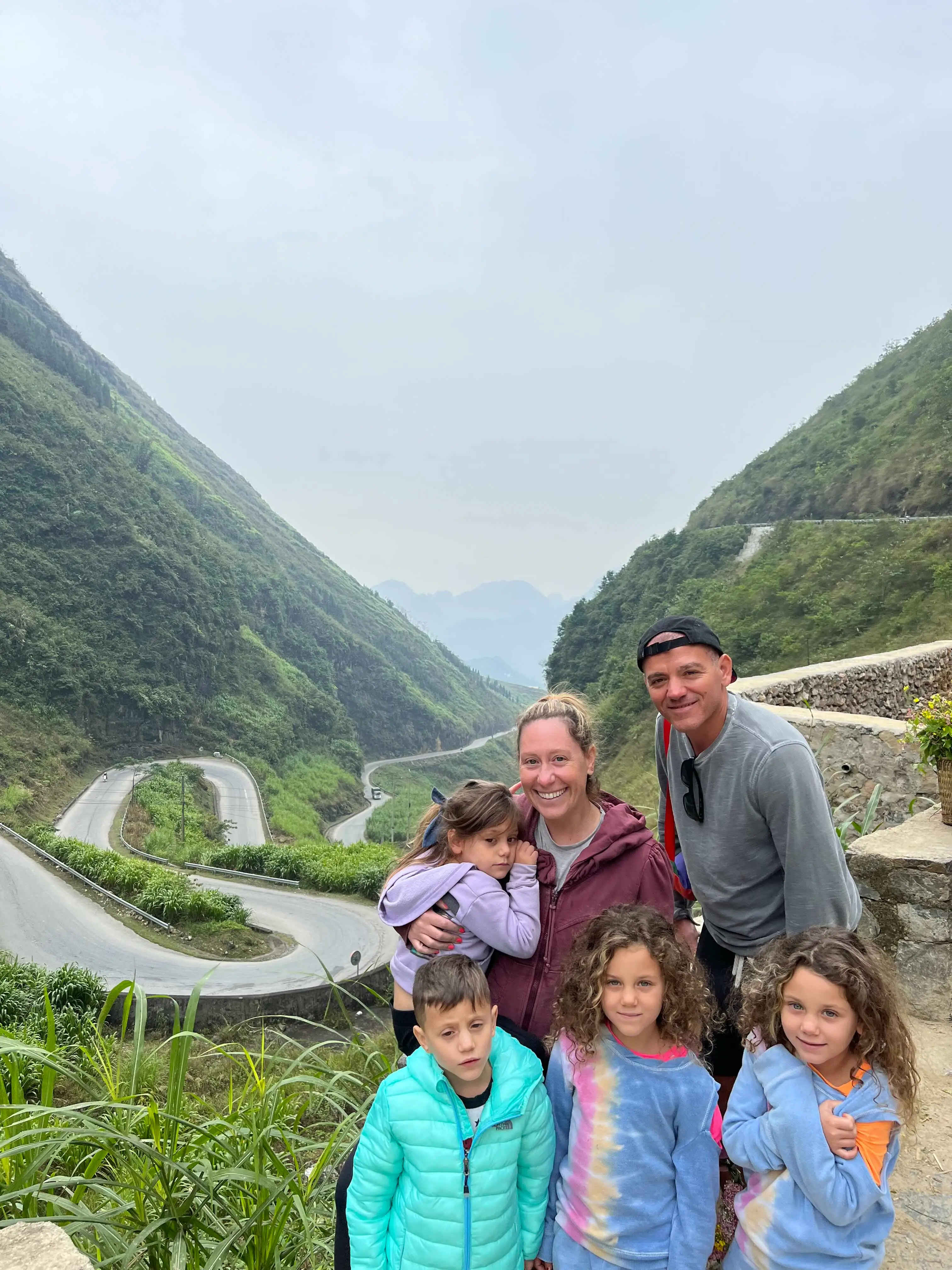 A family of six in Ha Giang Loop in Vietnam.
