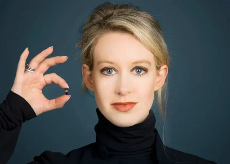 Elizabeth Holmes’ most famous photo started with a simple request from a photographer