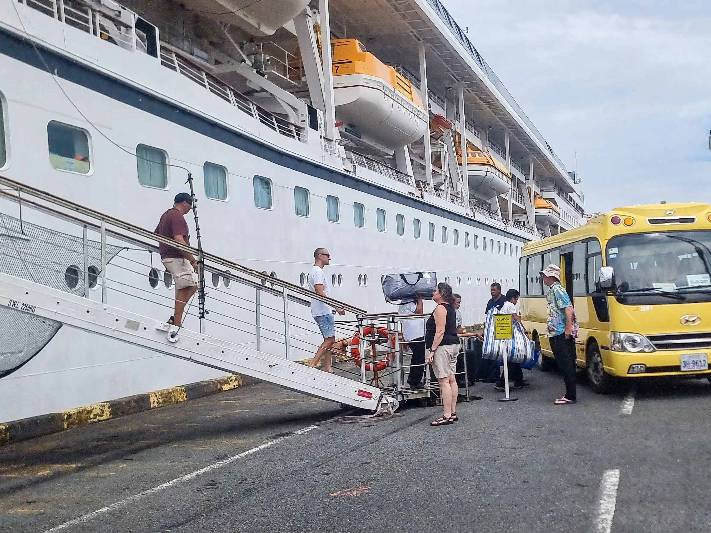 Passengers leaving the Villa Vie Residences' cruise ship Odyssey.