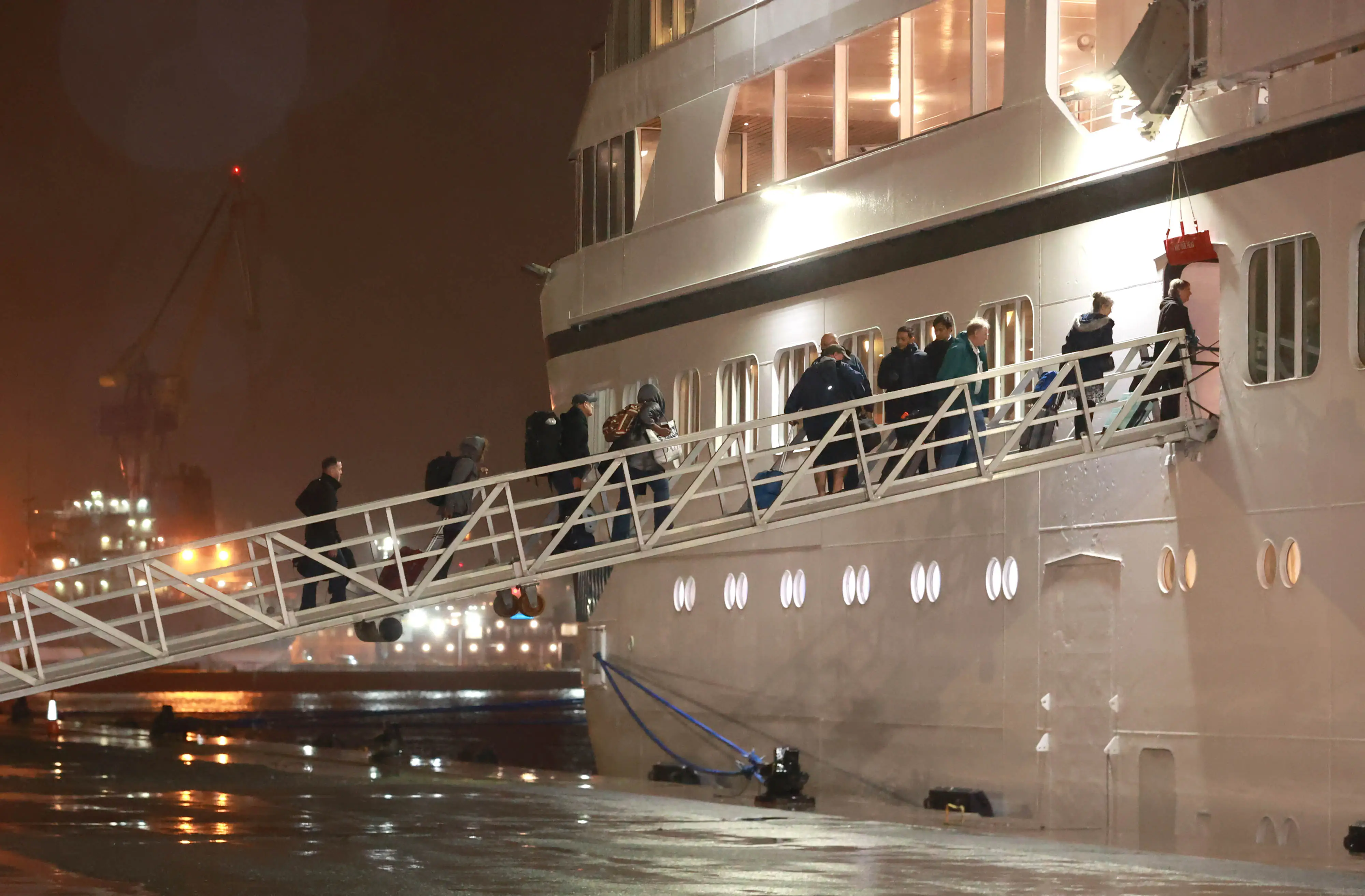 Passengers board the Villa Vie Odyssey cruise ship at Belfast Port's Cruise Ship Terminal,