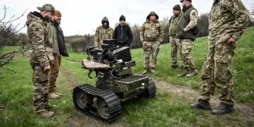 Ukraine’s war robots keep soldiers out of danger, but humans still risk their lives to keep them running