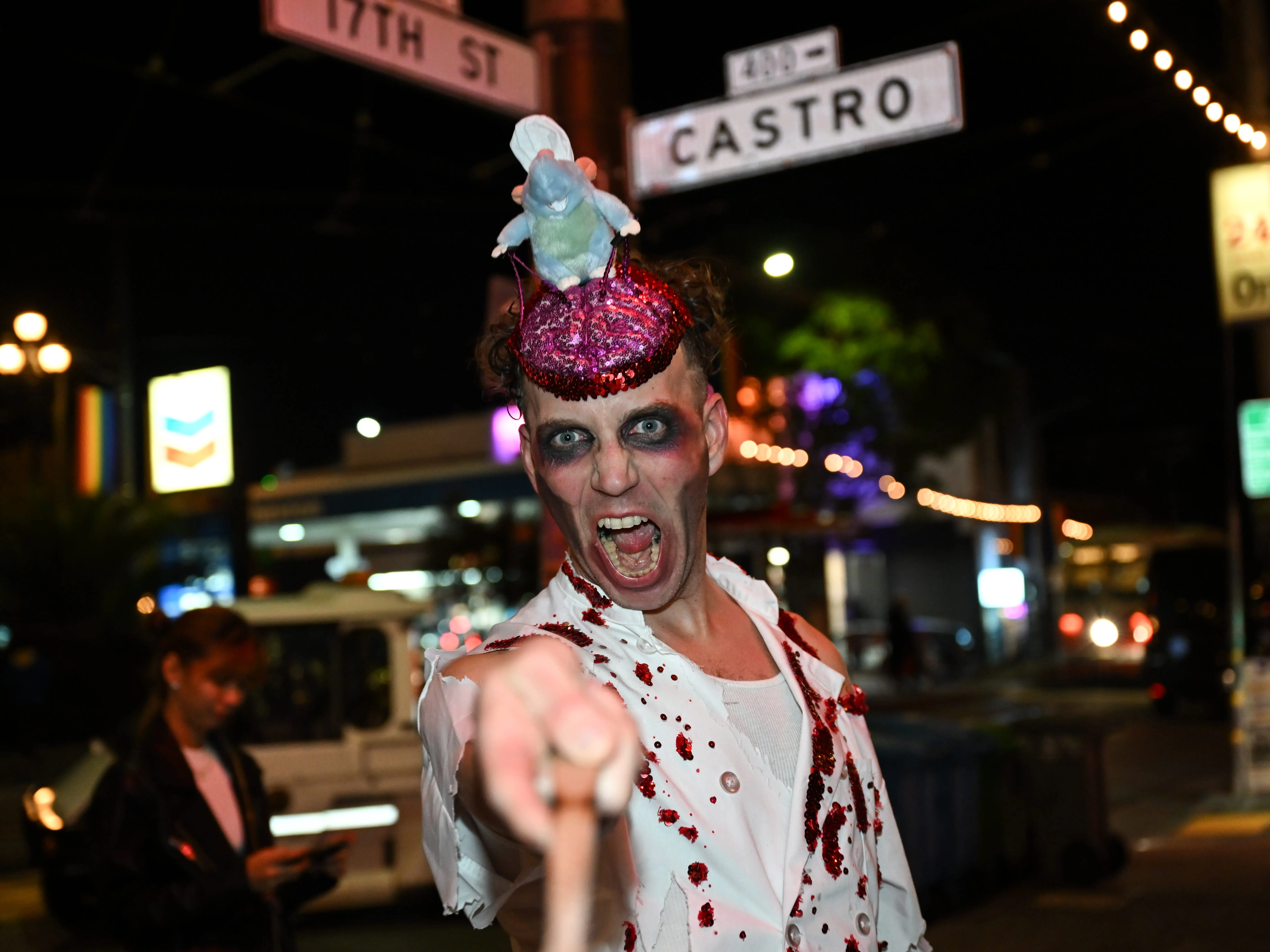 A man is seen in costume and make up during Halloween night on Castro Street of San Francisco in California, United States on October 31, 2024.