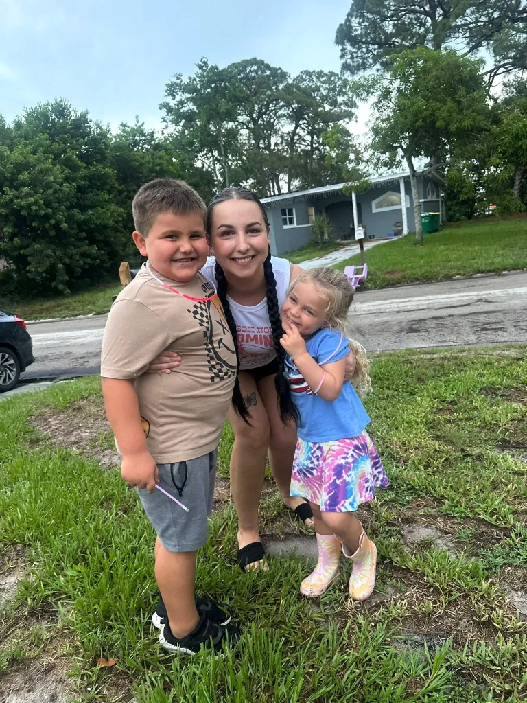 Remy, 7, mother Olivia and Aria, 5
