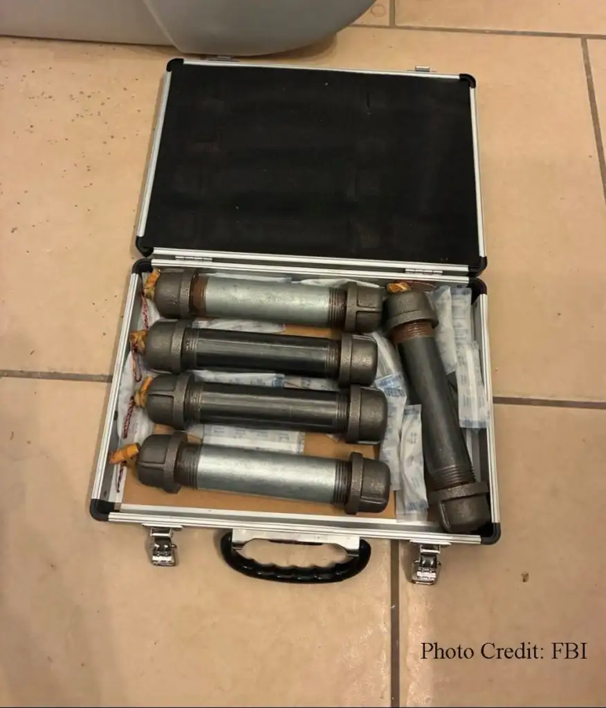 Investigators executed a search warrant and recovered six improvised explosive pipe bombs and one inert device