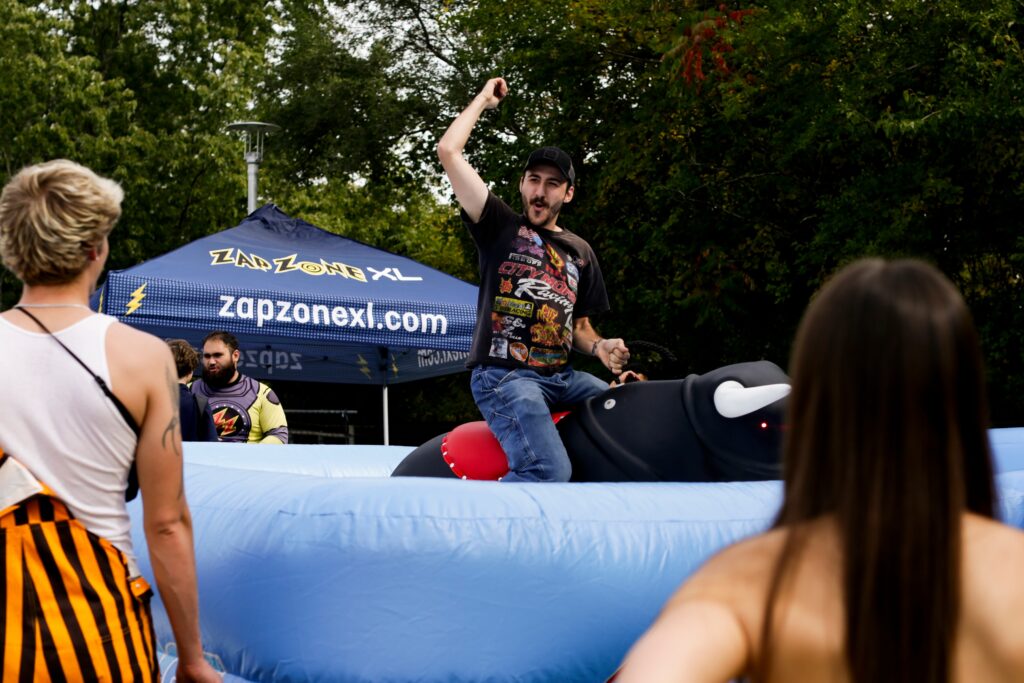At a Western Michigan tailgate party, Trump’s gains with young men are tested