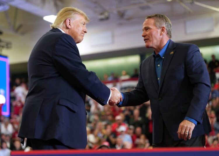 Trump’s closing argument? Forget the issues. Look at the men.