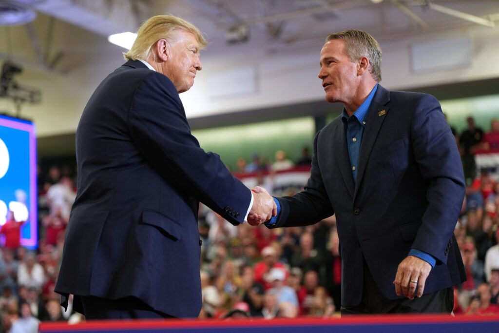 Trump’s closing argument? Forget the issues. Look at the men.