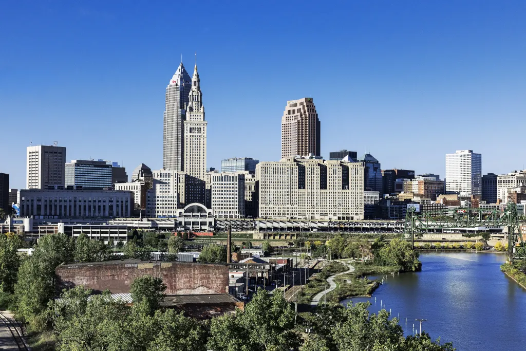 A daytime view of the Cleveland skyline from across the Cuyahoga River.