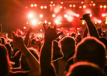 Punk Rock Singer Throws Up Mid-Show, Random Fan Takes Over Vocals Before Security Drags Him Offstage