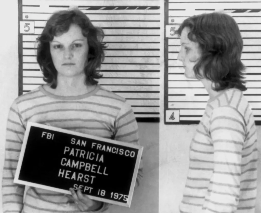 Hearst poses for an FBI mugshot after her arrest for bank robbery on September 18, 1975 in San Francisco, California.