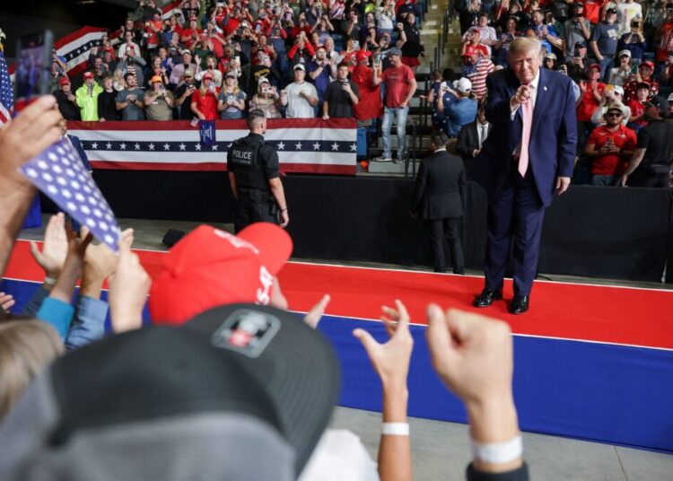 In Kansas, Trump says a pastor running as a Democrat ‘mocks Jesus’