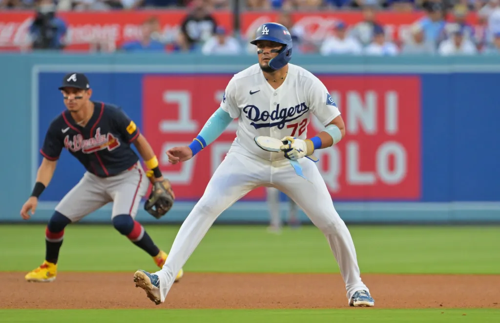 Los Angeles Dodgers player stands on base during a game against the Atlanta Braves.