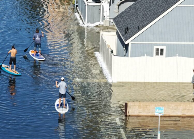 Record high tides bring flooding and glimpse of sea-level rise to California
