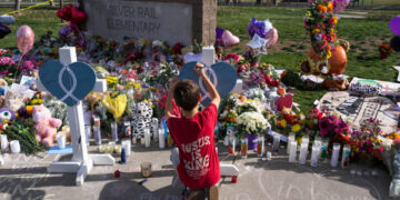 Oregon town known for its outdoor recreation reels after school shooting