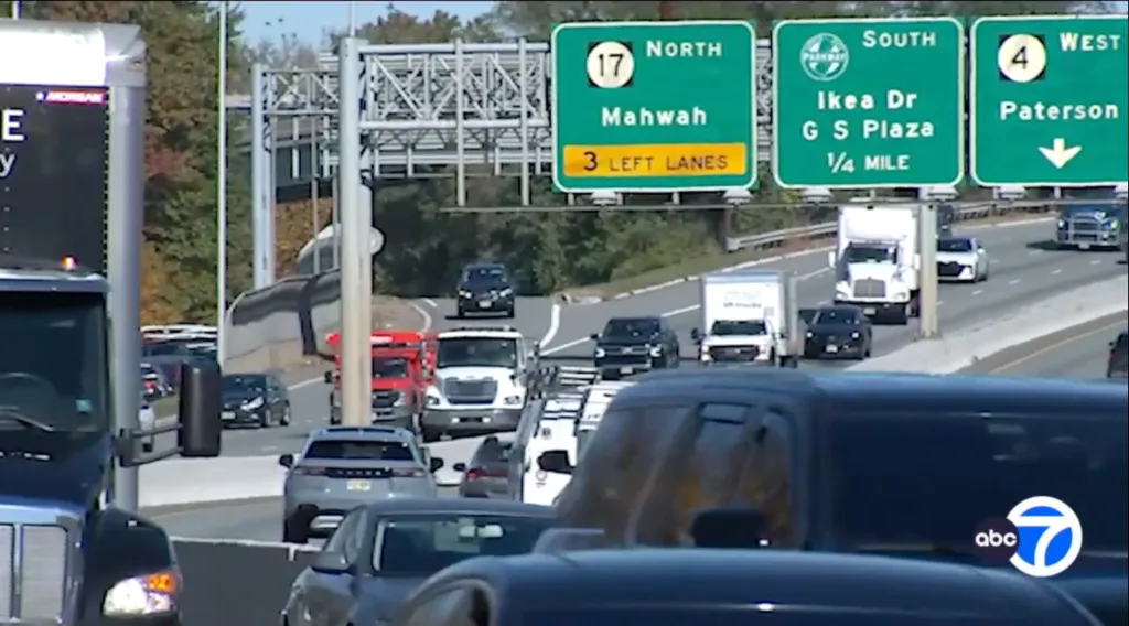 Green overhead highway signs indicate directions for Route 17 North toward Mahwah, the Garden State Parkway South toward Ikea Drive, and Route 4 West toward Paterson, above heavy traffic.