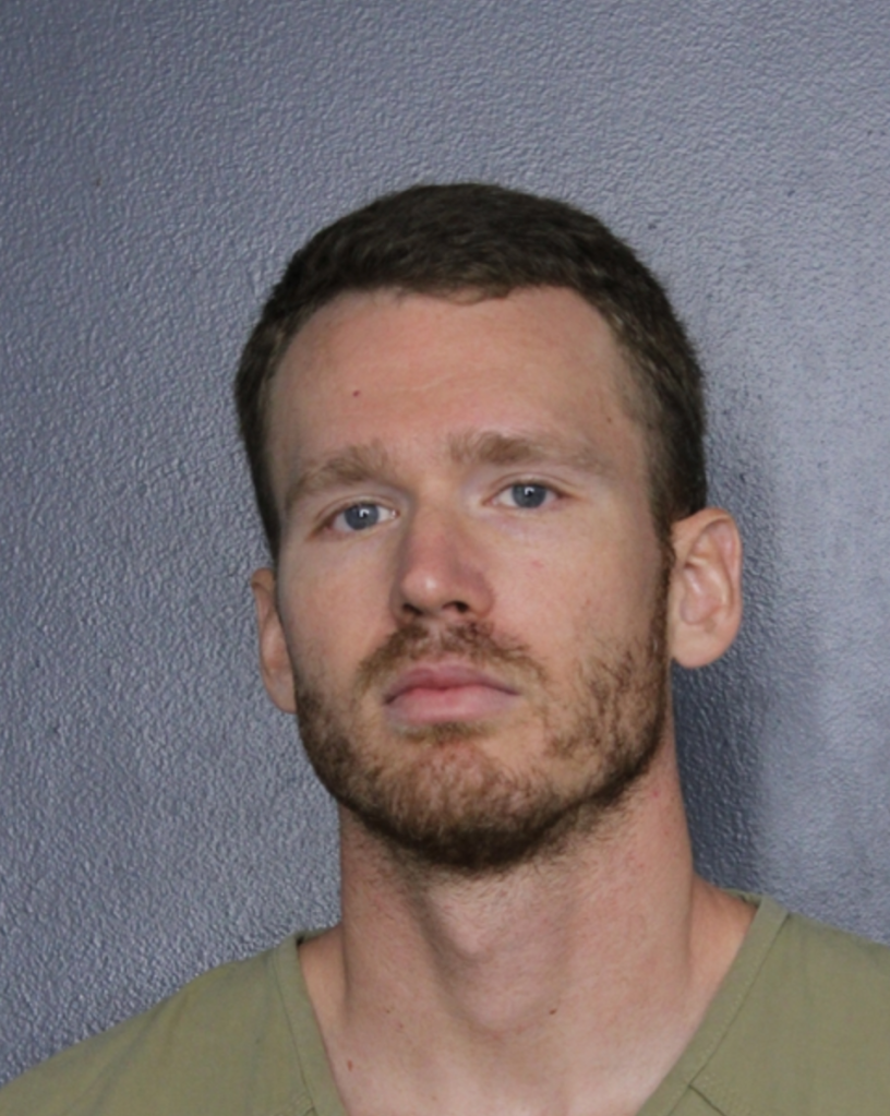 Lauderhill Police officer Brian Louis Sguros was arrested for illegally taking possession of a man's home after he helped find him dead back in July 2022.