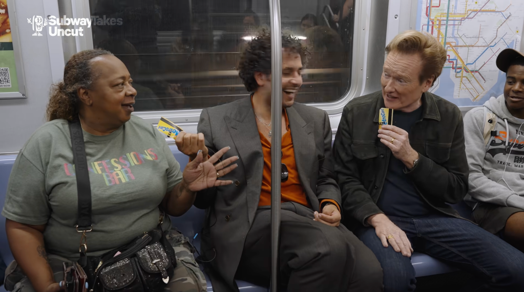 Brooklyn bar owner Debbie Shields riffs with Conan O'Brien aboard an F train during an appearance on 