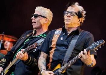 Longtime Guitarist to Step Away From Iconic Punk Band After Sudden Health Issue