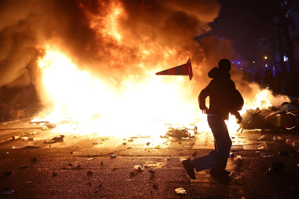 Destructive protests sweep across France, with buildings burned and hundreds detained