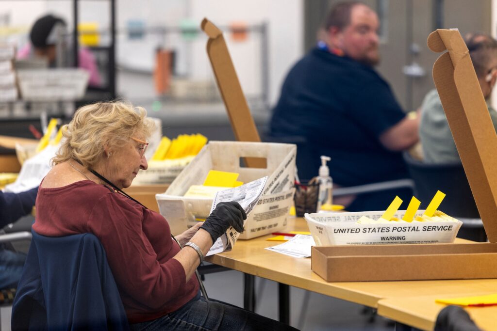 California ballots targeted by Trump can be counted for now under court ruling