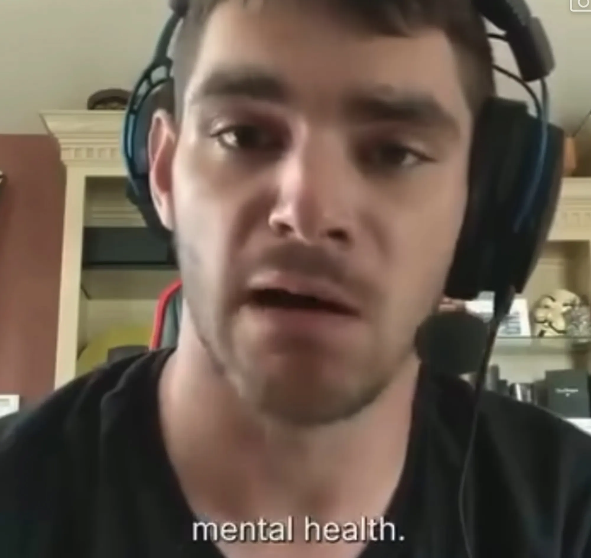 RJ Mitte wearing a headset while speaking during a video call.