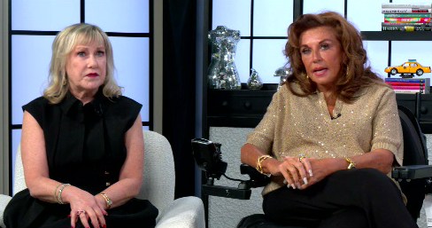 Abby Lee Miller and Cathy Nesbitt-Stein sitting together in a room.