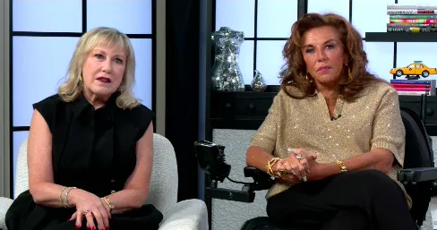 Abby Lee Miller and Cathy Nesbitt-Stein sit next to each other.
