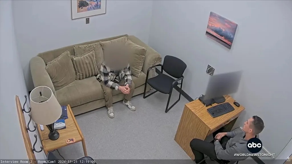Campus police interview a student witness in an interview room.