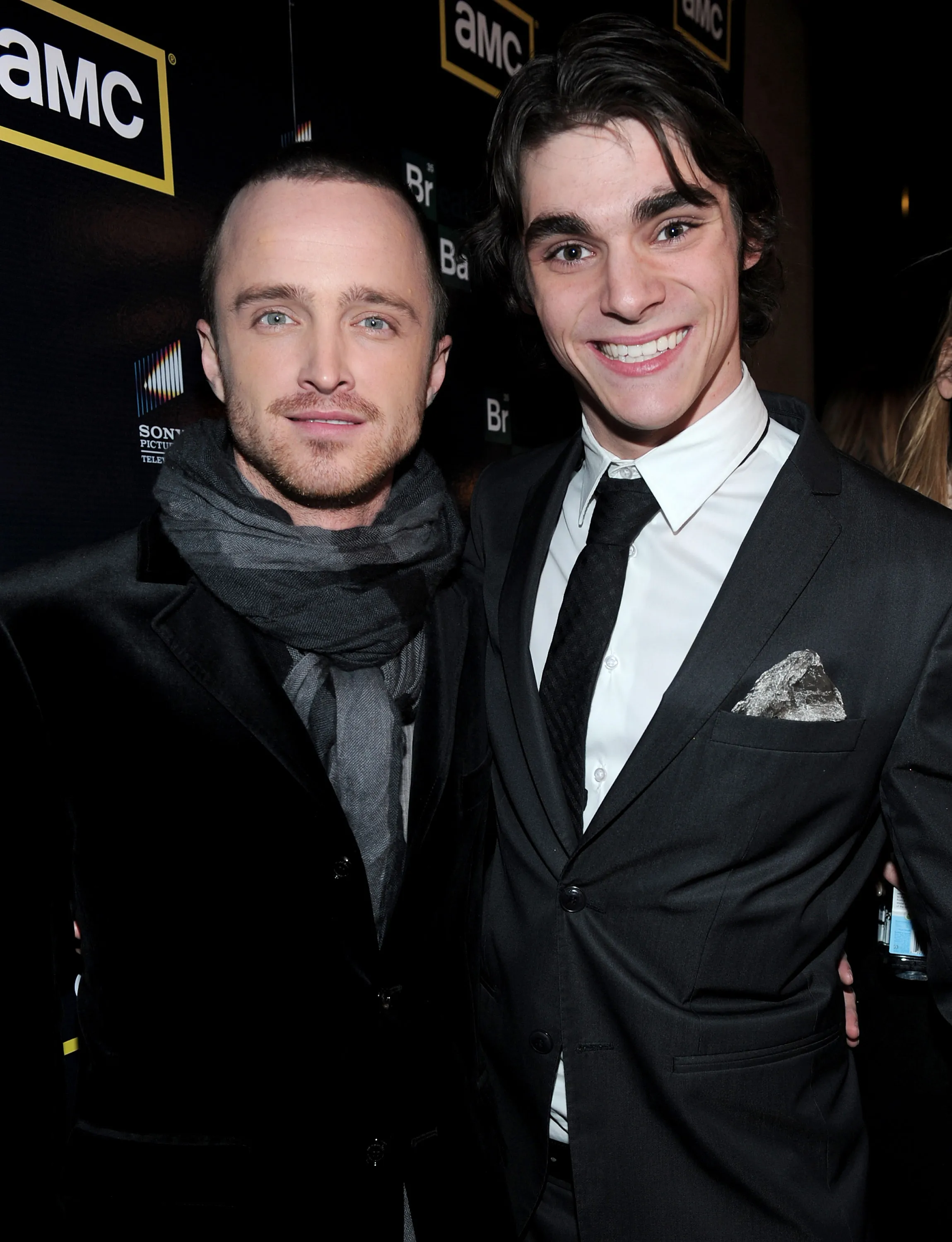 Actors Aaron Paul and RJ Mitte pose together at the premiere of 