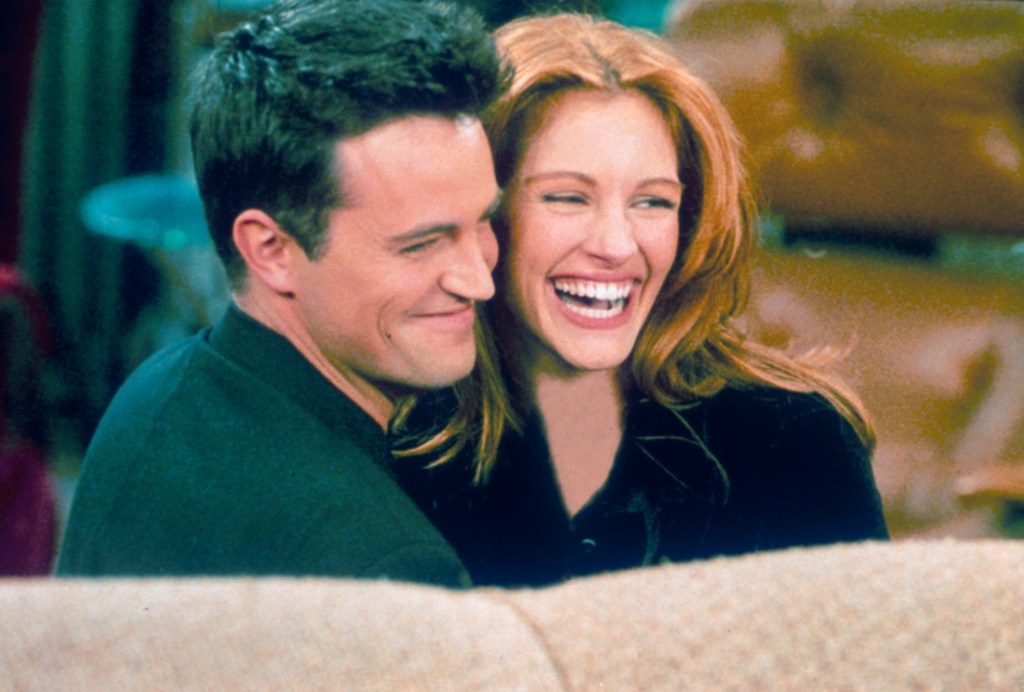 Actor Matthew Perry and actress Julia Roberts on the set of Friends.