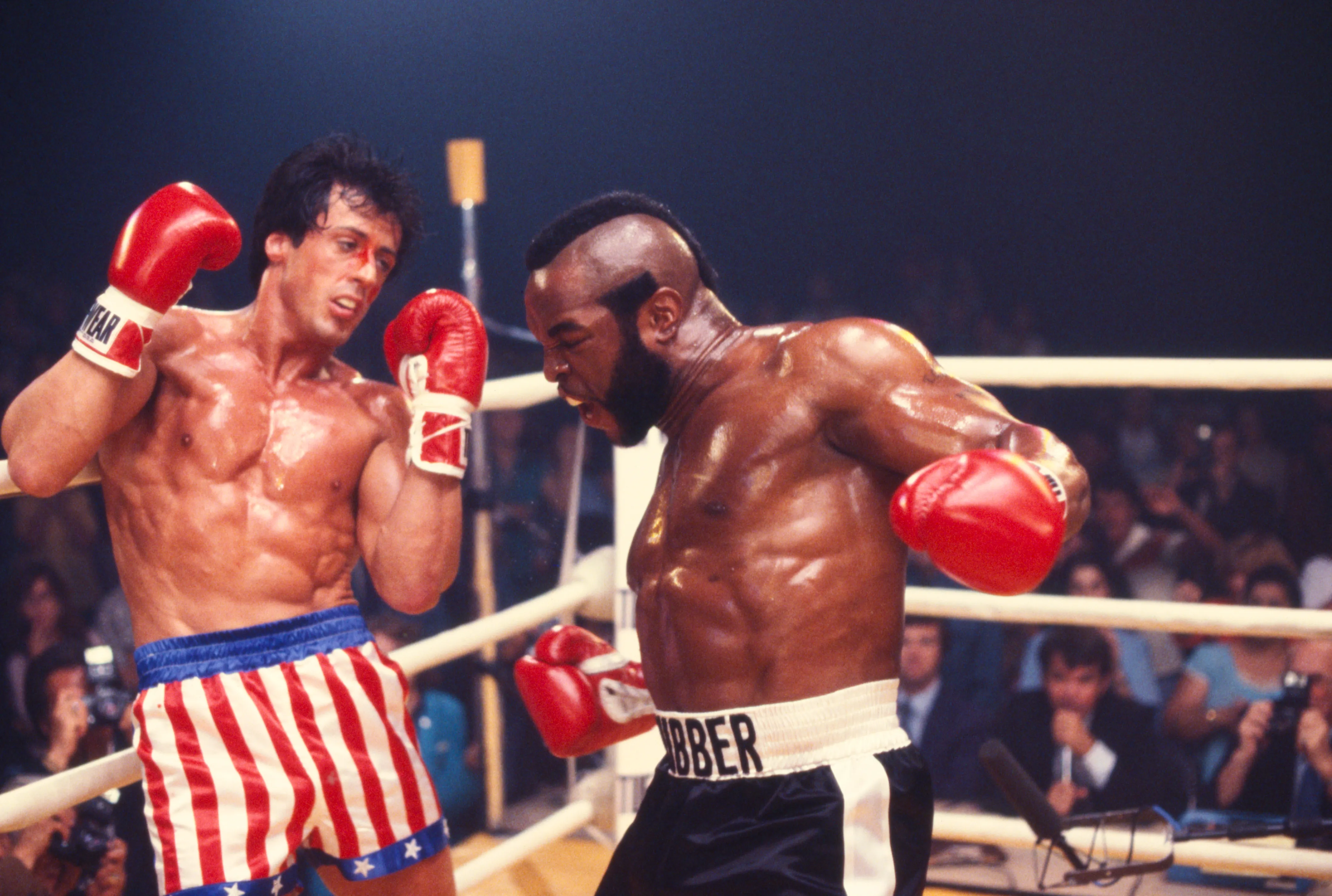 Sylvester Stallone, portraying Rocky Balboa, battles Mr. T's Clubber Lang during