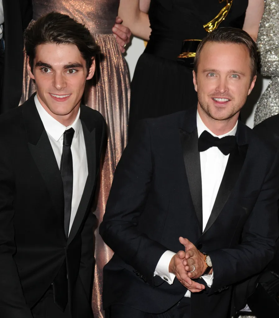 Actors RJ Mitte and Aaron Paul pose together in the press room at the Primetime Emmy Awards.
