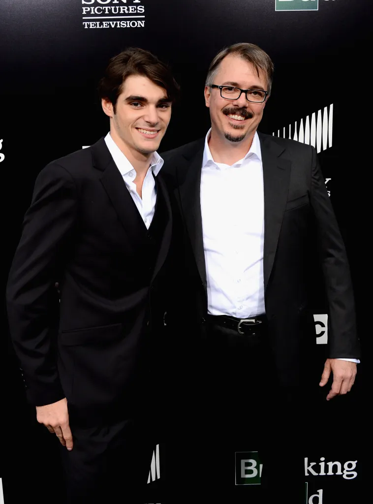 Actor RJ Mitte and executive producer Vince Gilligan pose together at an event for 