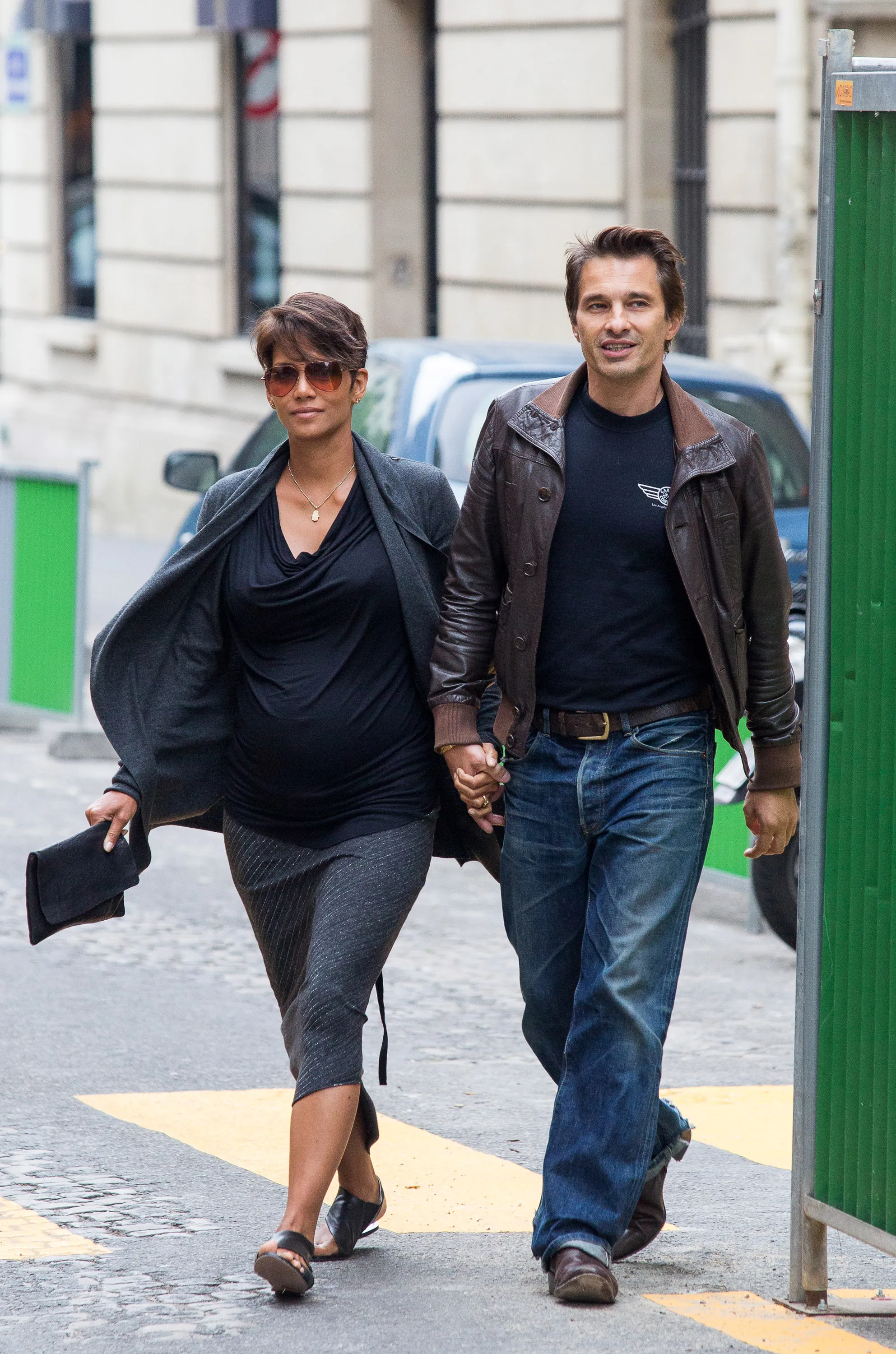 Halle Berry and Olivier Martinez walking hand-in-hand down a street in Paris.