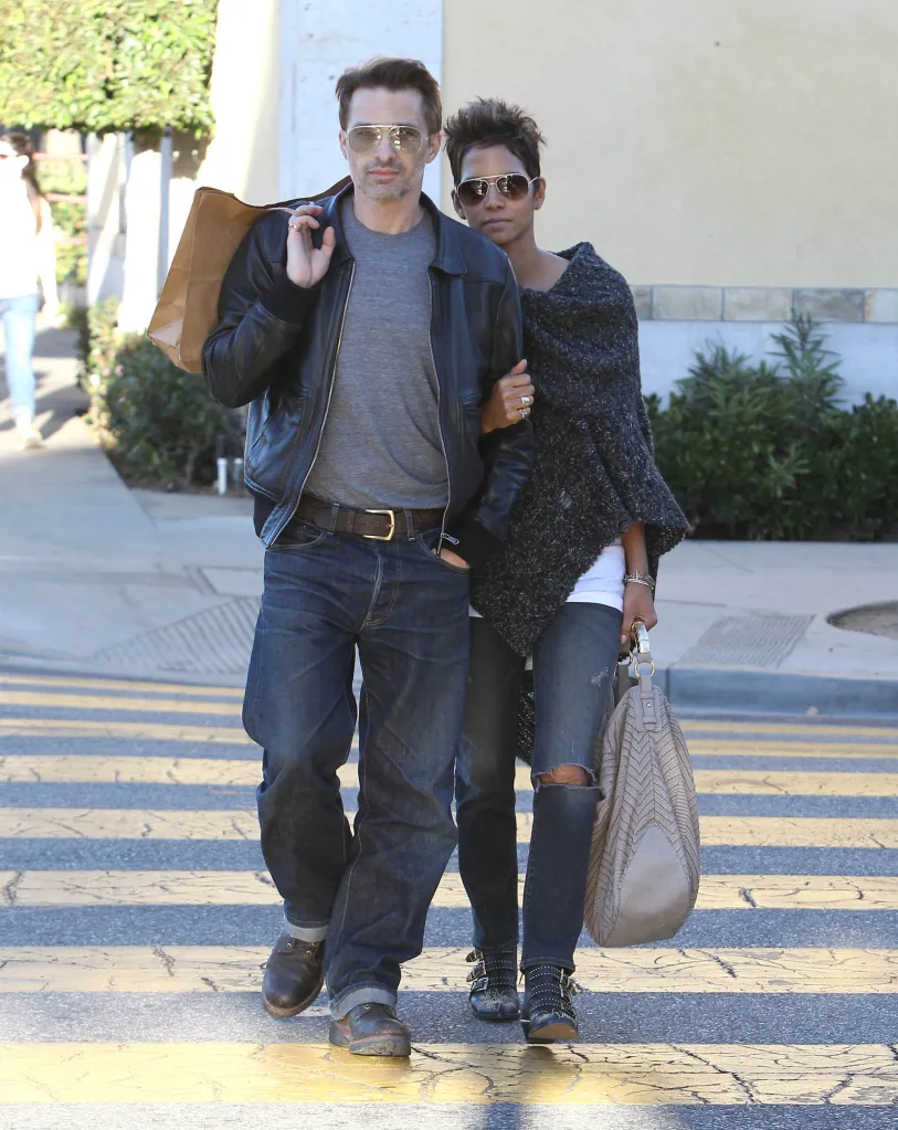 Actress Halle Berry and Olivier Martinez walking together on a street in Los Angeles.